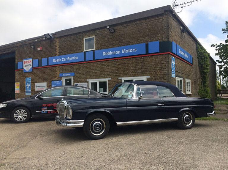 classic car garage 768x572