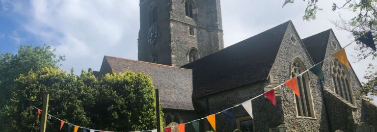 St Nicholas Church with bunting 2000x700 1 768x269